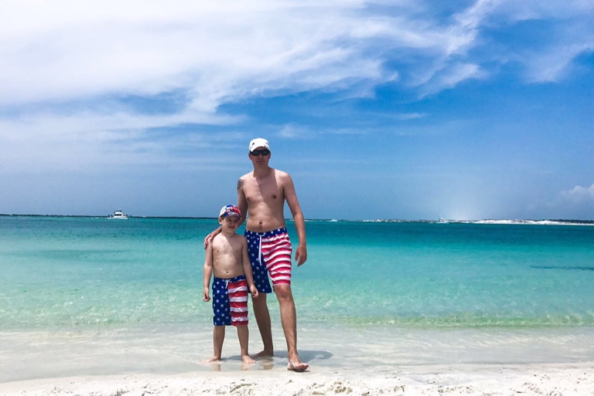 Sergey and our son on a Florida beach, 2017